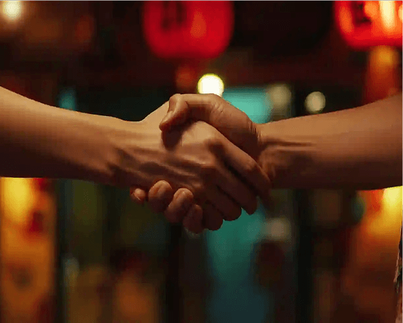Two people shaking hands, representing trust and a clear, honest career story